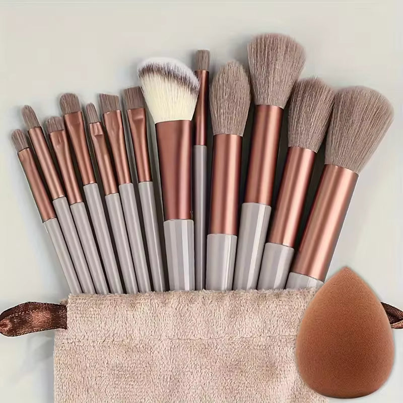 14-piece makeup brush set in brown, with beige pouch and blending sponge