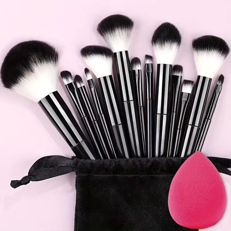 14-piece makeup brush set in black, with black velvet pouch and pink blending sponge