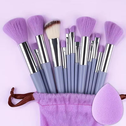 14-piece makeup brush set in purple, with purple pouch and blending sponge